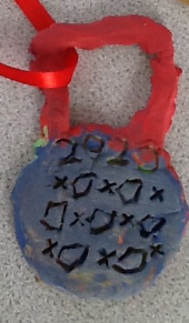 We painted the Olympic medals we designed and made of clay last week.